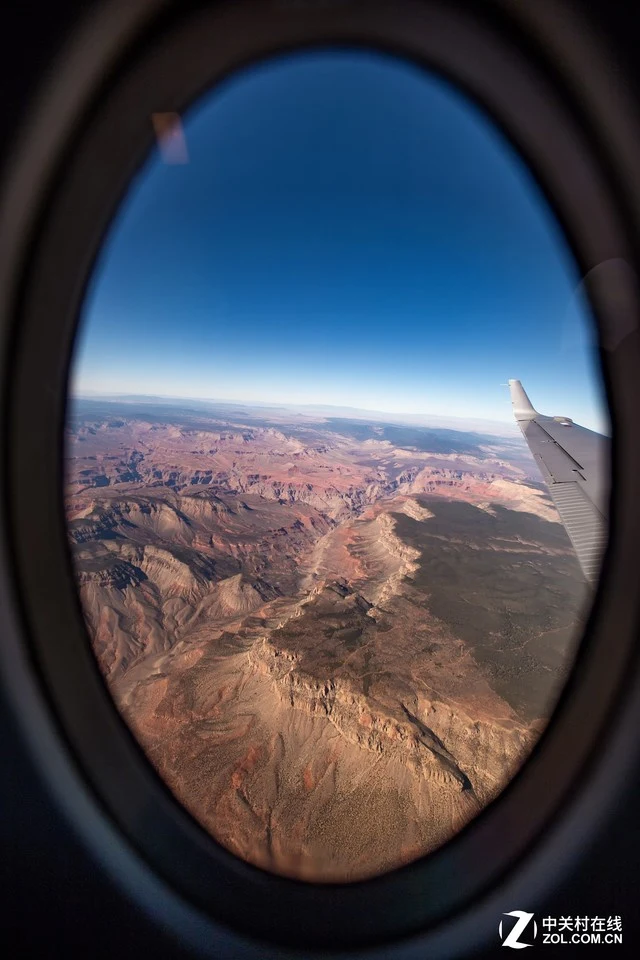 丢掉无人机!教你如何在飞机上拍风光