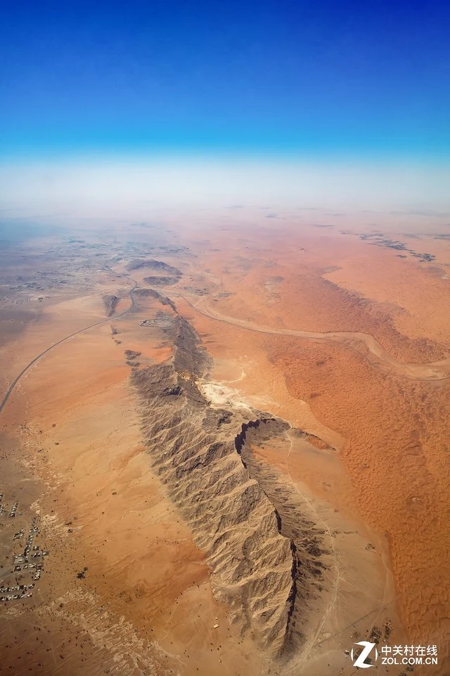 丢掉无人机!教你如何在飞机上拍风光